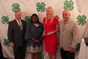 Picture of (left to right): Dr. Mike Yoder, Assoc. Director & State Program Leader, 4-H; Dr. Claudette Smith; Associate Administrator, N.C. A&T Extension Administration; Awards Recipient - Coleman Killinger, 4-H Youth Development Agent, N.C. Cooperative Extension – Carteret County Center; and, Dr. A. Richard Bonanno, Director of N.C. State Extension, Associate Dean, CALS.