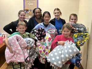 Carteret County 4-H Youth delivering blankets to Southeastern Medical Oncology - pictured with nurses.